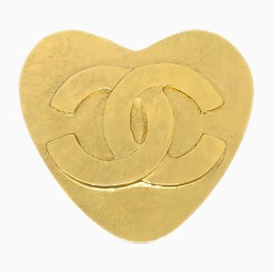 Broche de corazón dorado de Chanel