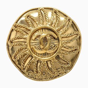 Goldene Sonnenbrosche mit Medaillon von Chanel
