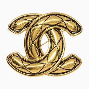 Broche acolchado en dorado de Chanel