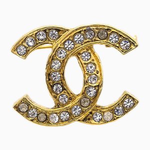 Broche de diamantes de imitación en dorado de Chanel