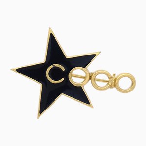 Broche de estrella negro de Chanel