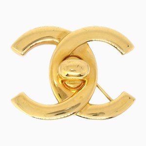 Grande Broche Turnlock Dorée de Chanel