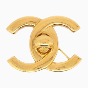 Grande Broche Turnlock Dorée de Chanel
