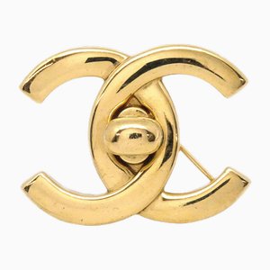 Broche Turnlock Dorée de Chanel
