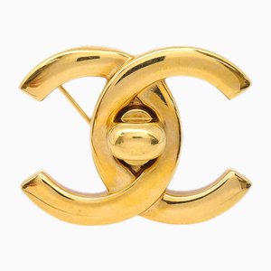 Gold Turnlock Brooch from Chanel