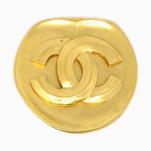 Spilla rotonda dorata di Chanel