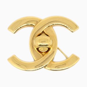 Broche Turnlock Dorée de Chanel