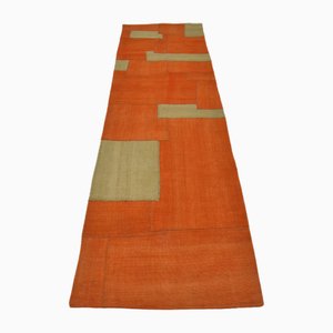 Alfombra de pasillo tribal vintage en naranja y verde, 1960