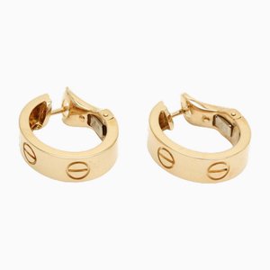 Aretes Lθve Love de oro amarillo de 18 k B8022500 de Cartier. Juego de 2