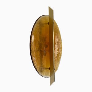 Italienische Wandlampe aus bernsteinfarbener Muranoglasscheibe und Messing Metallrahmen von Simoeng