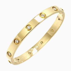 Pulsera Love con diamantes completos en oro amarillo de Cartier