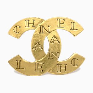 Broche CC en dorado de Chanel