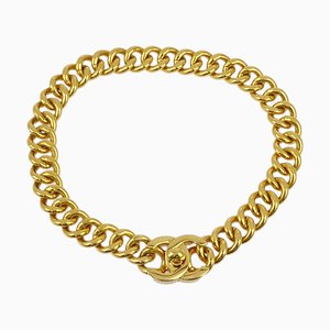 Collar Turnlock de cadena dorada de Chanel