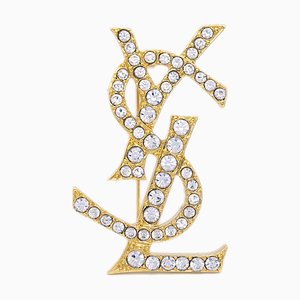 Broche de diamantes de imitación y oro de Yves Saint Laurent