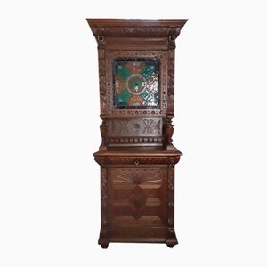 Slim Top Cabinet in Carved Oak with an Attachment with Colored Leaded Glazing, 1890s