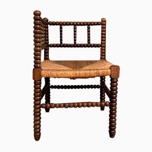 Silla esquinera francesa antigua de madera torneada y asiento de paja, década de 1890