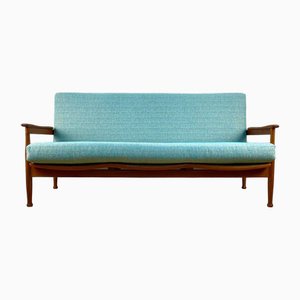 Divano Mid-Century in teak attribuito a Guy Rogers, anni '60