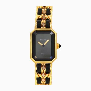 Orologio da donna con quadrante nero al quarzo dorato di Chanel