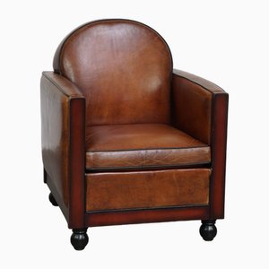 Art Deco Leather Armchair Finished with Wood and Fantastic Cognac-Colored Leather
