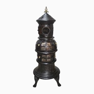 Antique Cast Iron with Engraved Figures Stove