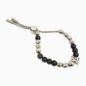 Bracciale con perle in metallo nero con monogramma argentato di Louis Vuitton