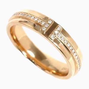 Anello stretto con due diamanti in oro rosa di Tiffany & Co.