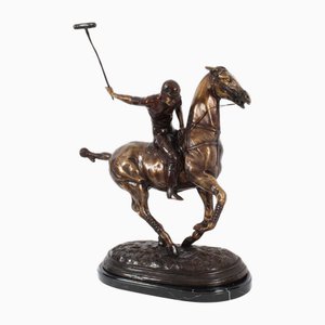 Escultura de caballo al galope de jugador de polo, siglo XX, bronce