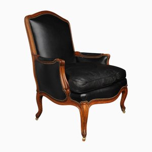 Französischer Louis XV Bergere Sessel aus schwarzem Leder mit Messingbeschlägen