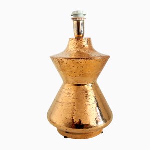 Lámpara de mesa italiana de cerámica en dorado metálico de Aldo Londi para Bitossi, años 60