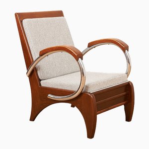 Upholstered Armchair in Wood, Plywood, Chrome-Plated Tubular Steel with Volz Cushion