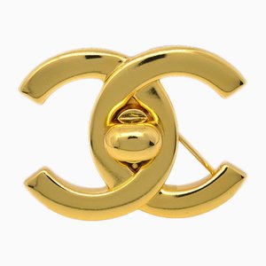 Broche Turnlock en dorado de Chanel