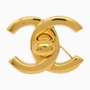 Spilla Turnlock dorata di Chanel