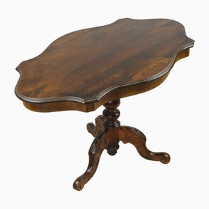 Biscuit-Style Carved Walnut Coffee Table with Open-Stained Veneer