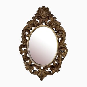 Specchio rotondo in bronzo dorato