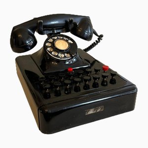 Teléfono de escritorio vintage con baquelita negra, 1956