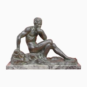 Figura masculina Art Déco de hombre sentado, siglo XX, bronce