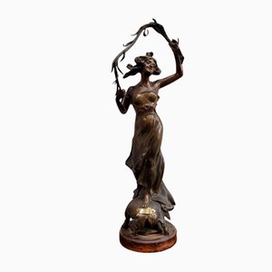 Henri Ple, Figurine Femme Fleur des Alpes, 20ème Siècle, Métal