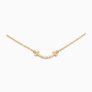 18k Mini T Smile Pendant Necklace from Tiffany & Co.