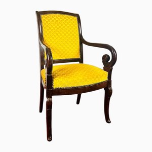 Poltrona in legno intagliato e velluto giallo, Francia, 1820
