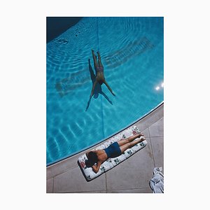 Slim Aarons, Swimmer and Sunbather, Estate Stamped Photographic Print, 1959 / 2020s