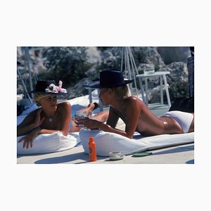 Slim Aarons, Sunbathing in Antibes, Estate Stamped Photographic Print, 1976 / 2020s