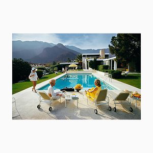 Slim Aarons, Catch Up by the Pool, 1970s, Estate Stamped Photographic Print