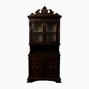 Aparador de doble cuerpo de madera tallada, década de 1890