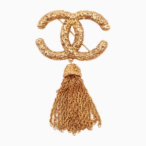 Coco Mark Tassel Brooch in Yellow Gold from Chanel