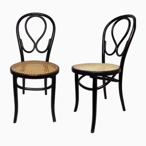 Sillas modernistas de madera curvada negra. Juego de 2