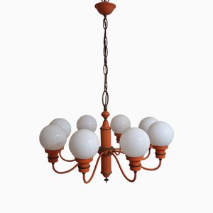 Mid-Century 8-Flame Chandelier with White Spherical Glass Shades on an Orange Frame, Set Off with Brass, 1960s