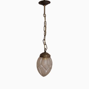 Lampada da soffitto con paralume in vetro a rilievo su base in ottone, Germania, anni '20