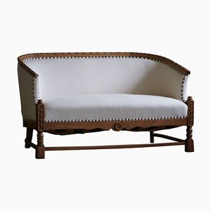 Danish Sculptural 2-Seater Sofa in Oak & Wool in the style of Skønvirke, 1920s