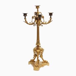 Candelabro de bronce dorado