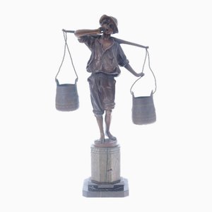 Figura in bronzo su base in marmo